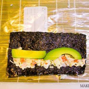 eagle-eye-view-of-sushi-roll-making-paprika-roll