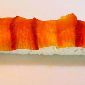paprika-on-top-of-a-sushi-roll