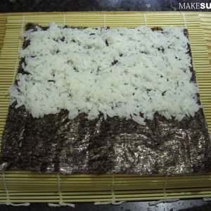 placing-rice-on-a-nori-sheet